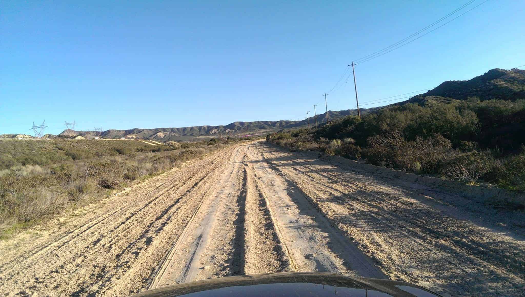 rutted tracks in a dirt road